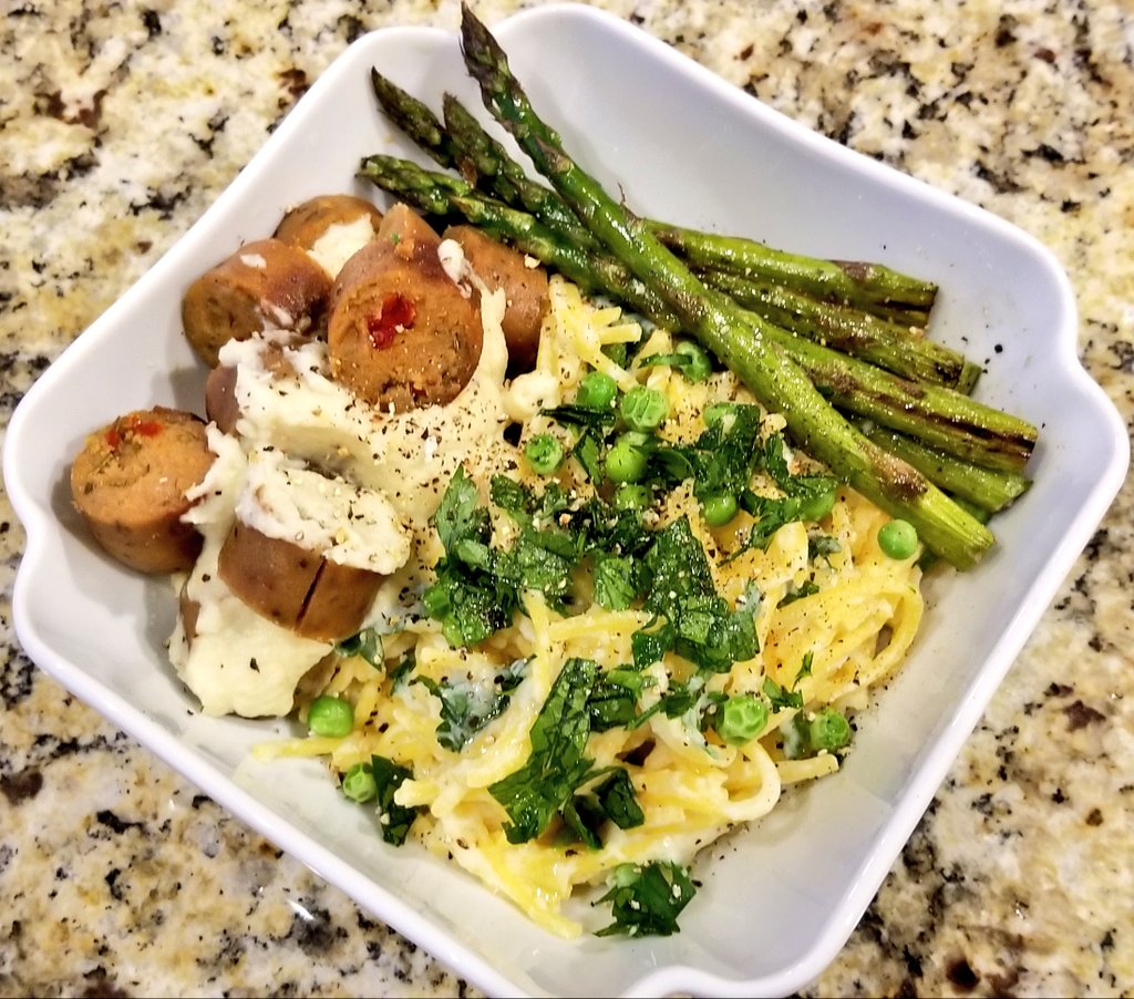 My dinner this evening: Gluten-free spaghetti topped with cauliflower cashew cream alfredo sauce, organic peas, and Italian parsley. Alongside grilled <a href="/FieldRoast/">Field Roast</a> Smoked Apple Sage sausages and asparagus sauteed in garlicy olive oil. Yum. #plantbaseddiet 😎 #ThursdayThoughts