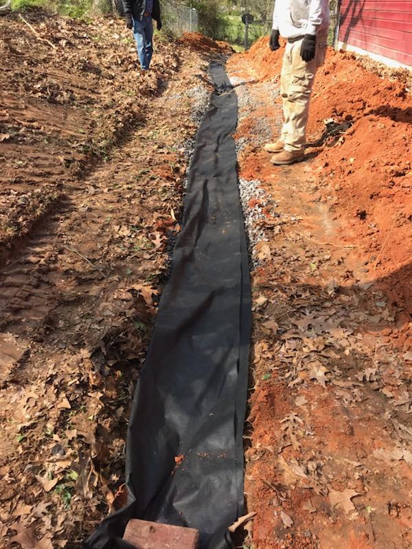 fpfconstruction's tweet photo. More than one customer realized this wet spring that a French Drain was required to keep water from their home.  #WaterDamageControl https://t.co/o2DHnxsYH6