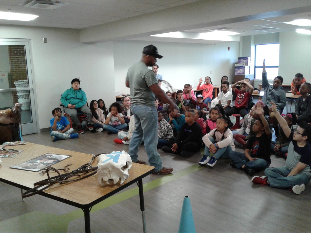 Forney4th's tweet photo. Black author and cowboy sharing his books and experiences with Compass 4th graders @MrCTaylorHMC @CompassHMC1 @adatschefski #HMC1_4Rs https://t.co/9UXstLJ0oJ