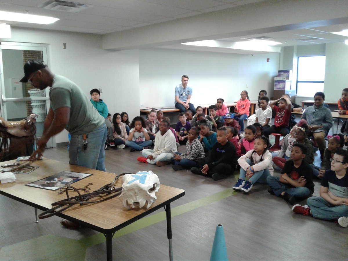 Forney4th's tweet photo. Black author and cowboy sharing his books and experiences with Compass 4th graders @MrCTaylorHMC @CompassHMC1 @adatschefski #HMC1_4Rs https://t.co/9UXstLJ0oJ