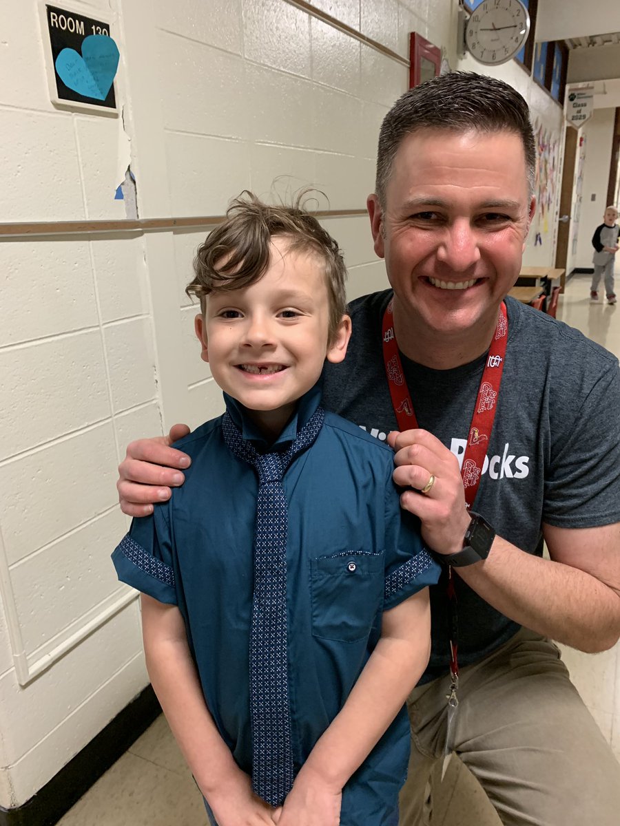 Spring picture day at Wilder! Dr. Steingraber helps tie a tie, so this young man looks sharp for his photo! #WilderRocks #PrincipalOfTheYear @WilderSPS @officialSPS