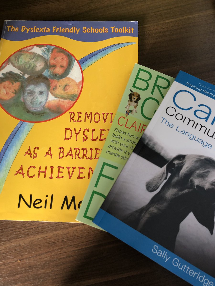 Mrs_M_Bernard's tweet photo. Some holiday reading #makingtimetoread #dyslexia #caninecommunication https://t.co/nIXp6d6P2e