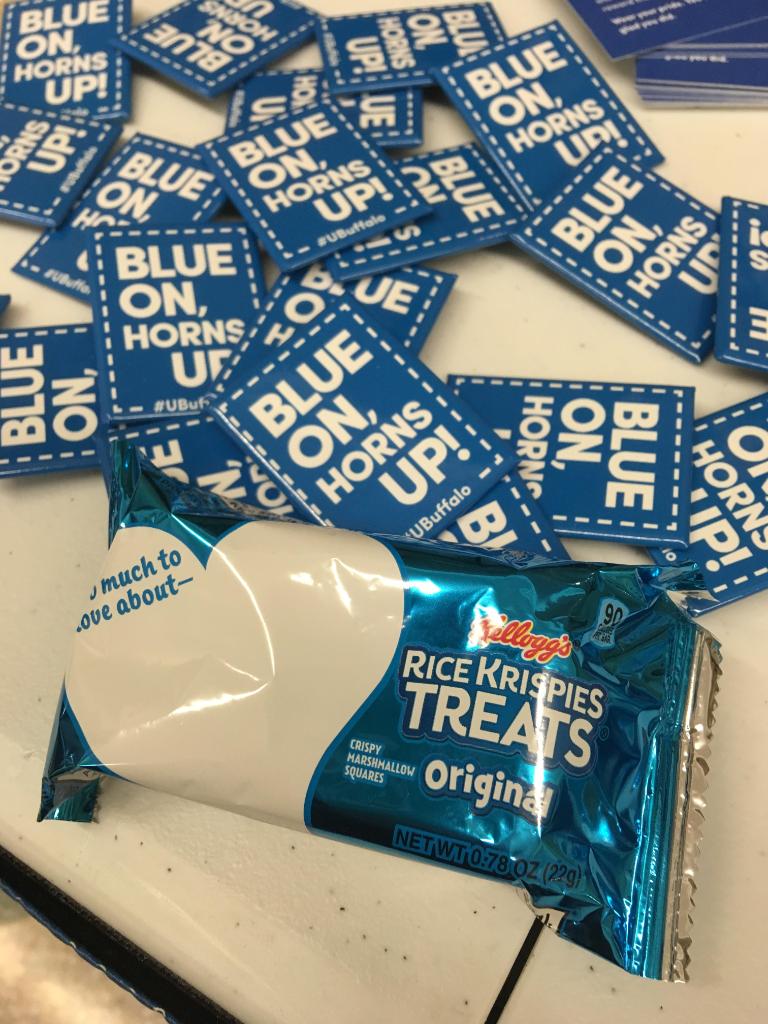 Blue buttons reading "Blue on, horns up!" and a Rice Krispie treat