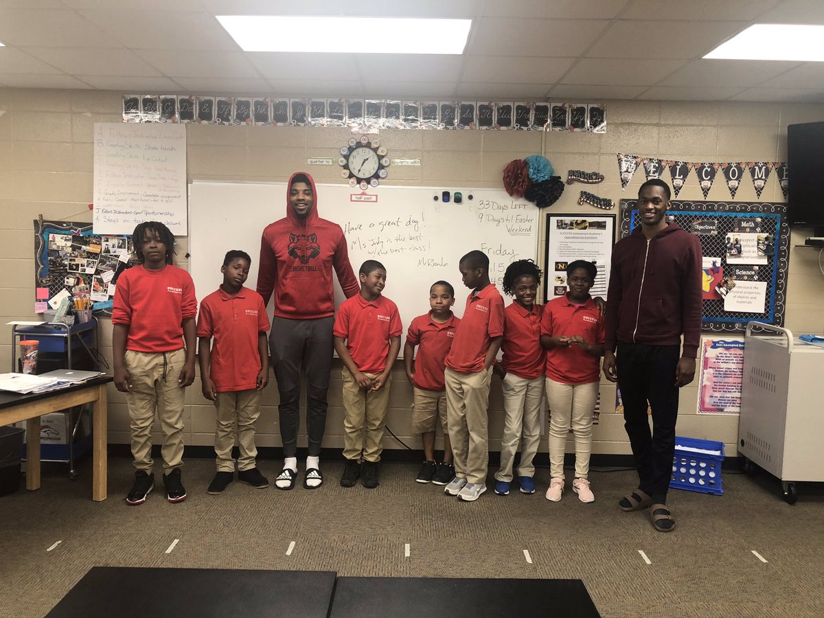 Successeagles's tweet photo. Great way to end a week.  @AStateMB players Malik Brebard &amp; Melo Eggleston mentoring and tutoring in Ms. Judy’s class.  You always make a huge impact while on our campus. @TerryMohajirAD @JPSHurricane https://t.co/yNadAAiTYS