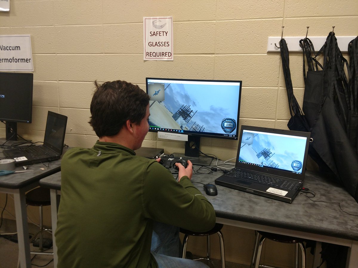 DevinMckinnon's tweet photo. Thank you, @CivilAirPatrol for donating the flight simulators.  Students come in for lunch to learn more about flying! #IKEengineering https://t.co/qFNhb3OW34