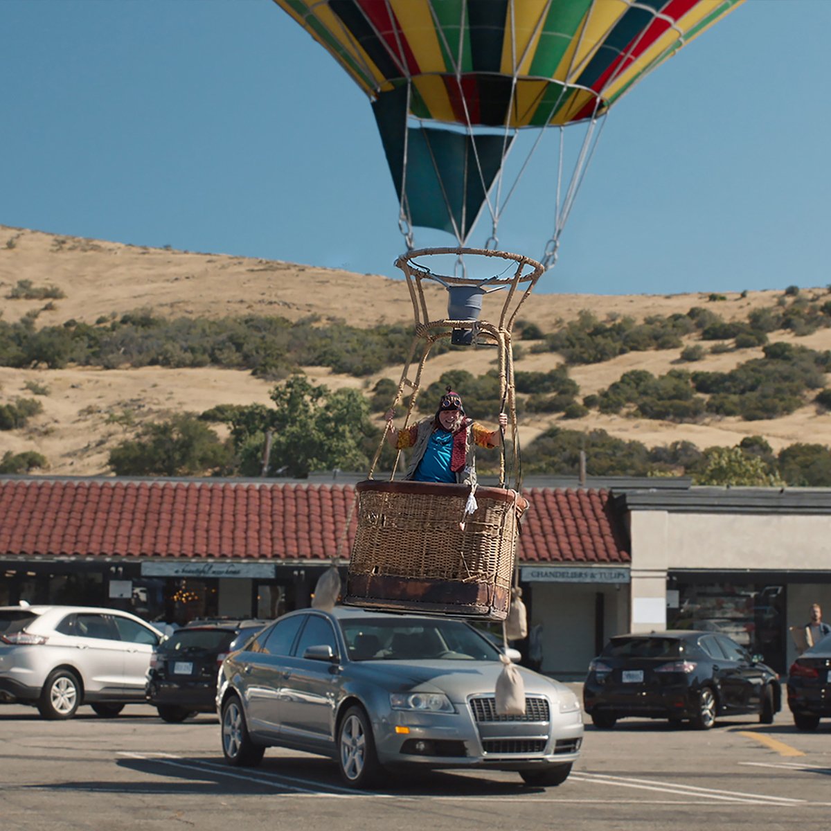 NatFoxInsurance's tweet photo. Think protecting your car hood in a crowded parking lot is a breeze? Think again. But fortunately, Farmers® covered this hit-and-fly incident. Give me a call to see if you have coverage for fly-by-ballooning. https://t.co/qtX04WnDq5