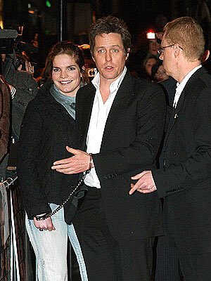 keatonkildebell's tweet photo. never forget the time a woman pretended to be a journalist interviewing hugh grant at the music &amp; lyrics premiere in 2007 but then ended up handcuffing herself to hugh &amp; walking the red carpet with him https://t.co/fe0MucftLn
