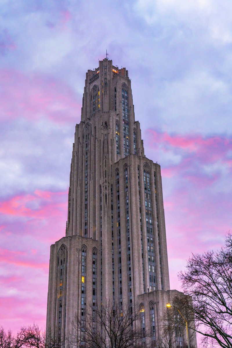 DaveDiCello's tweet photo. The colorful sky at sunrise this morning in #Pittsburgh didn't last very long, but it sure provided an incredible backdrop for the Cathedral of Learning on Pitt's campus, as vibrant pink and purple tones complemented the light blue clouds perfectly. https://t.co/NcvgYPARpK