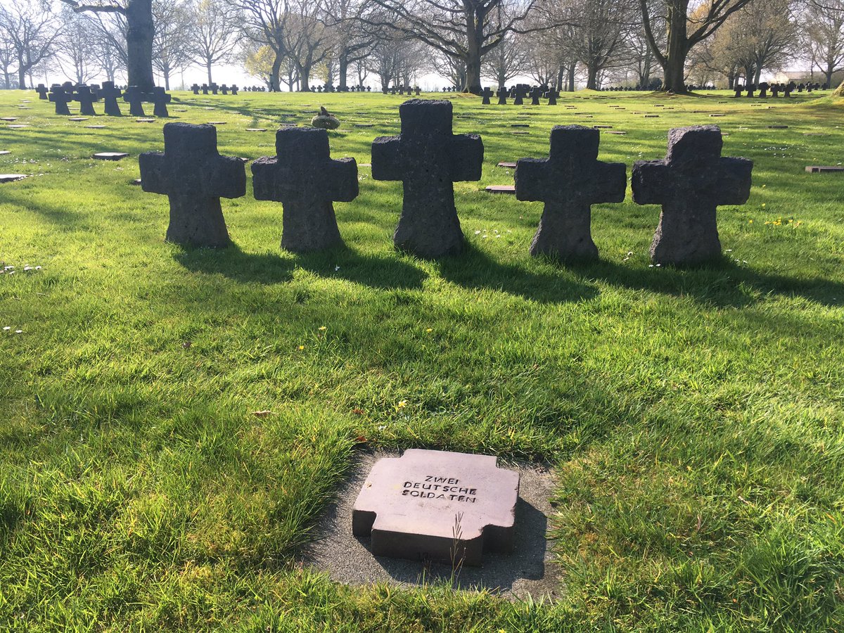 BoothamHistory's tweet photo. A reflective and sobering visit to La Cambe German cemetery, burial site of some 22,000 German soldiers #DDay75 #Normandy44 @boothamemc @BoothamSchool https://t.co/Y1CayD4xFu
