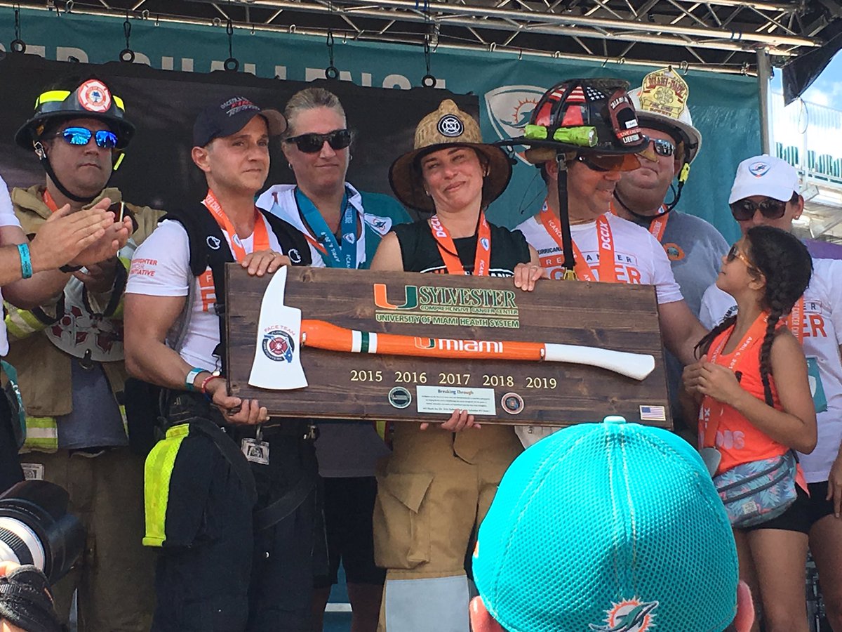 LisaWorley_UM's tweet photo. Amazing turnout from firefighters across the state to recognize the work of the #ExhaustCancer Firefighters Cancer Initiative @SylvesterCancer led by Dr Erin Kobetz. She was given the axe to breakthrough with innovation. #DCCIX https://t.co/KQZn02Vwda