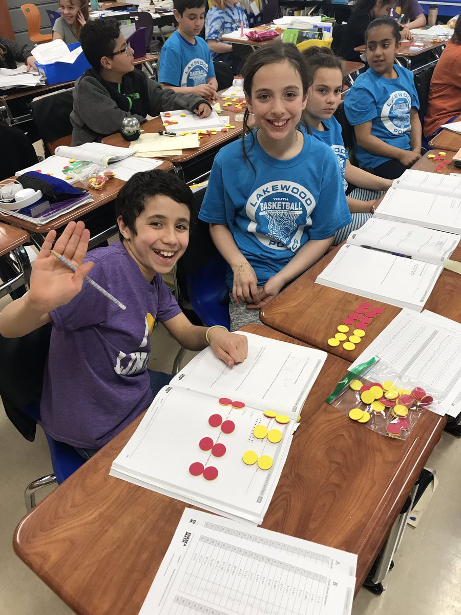 BigKatMath's tweet photo. Big Smiles in 5th grade math class when solving tough fraction problems with partners and concrete objects. #eurekamath #fractions #bigkatmath https://t.co/rMNFITS8SV