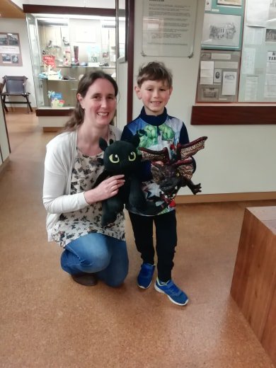 theshoemuseum's tweet photo. Lots of dragon hunters in the Museum today. Alex and his mum even brought Toothless  to visit. Our Here Be Dragons activities are on throughout the Easter holidays. See a Seadragon from Street, make a dragon shoe and follow the dragon trail and collect a dragon's egg at the end. https://t.co/cD3z0lW96A