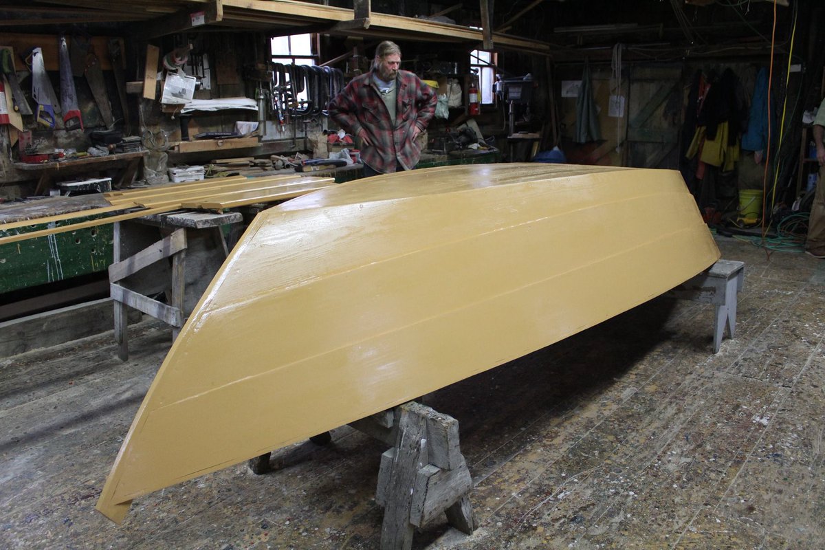 DoryShop's tweet photo. The building of a dory in 10 days - end of day 9, bottom caulked, exterior painted. #dory #doryboat #woodenboat #buildingaboat #Lunenburg #day9 #caulked #painted #dorybuff https://t.co/IffdljtxJD