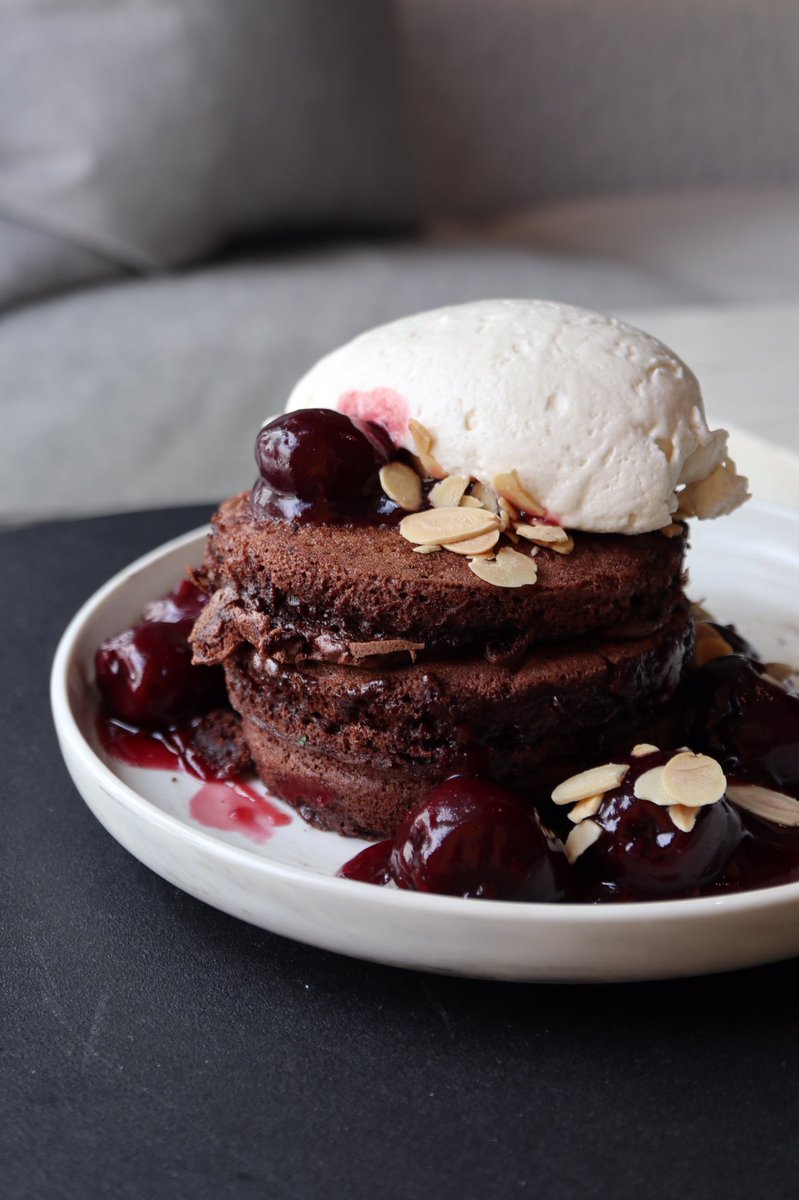 Post-food coma, #yycfoodtour day 2 is starting with brunch at <a href="/YellowDoorYYC/">Yellow Door Bistro</a> for the salted dark chocolate soufflé pancakes with red wine cherries. Holy moly I’m in chocolate heaven 😍🥞 #yycfood