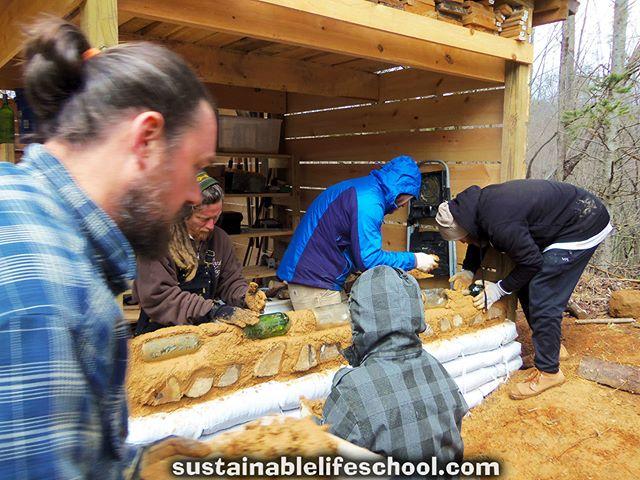 SusLifeSchool's tweet photo. Another pic from our latest #naturalbuilding #workshop. The wall participants were building is an #earthbag stemwall with #cordwood and #bottlewall up top. I will finish this side of the shed with some free windows to allow sun to shine on (and dry) the firewood stored there… https://t.co/JYekhTy6CB