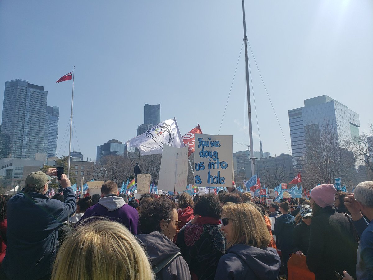 ClaireMcWatt's tweet photo. Today's #cutshurtkids rally was awesome! So great to meet folks all the way from Thunder Bay, and ran into activist Trustee @normsworld! Also brought Mervin to hang with the #protestdogs.
#onpoli https://t.co/cUCXuAqY6s