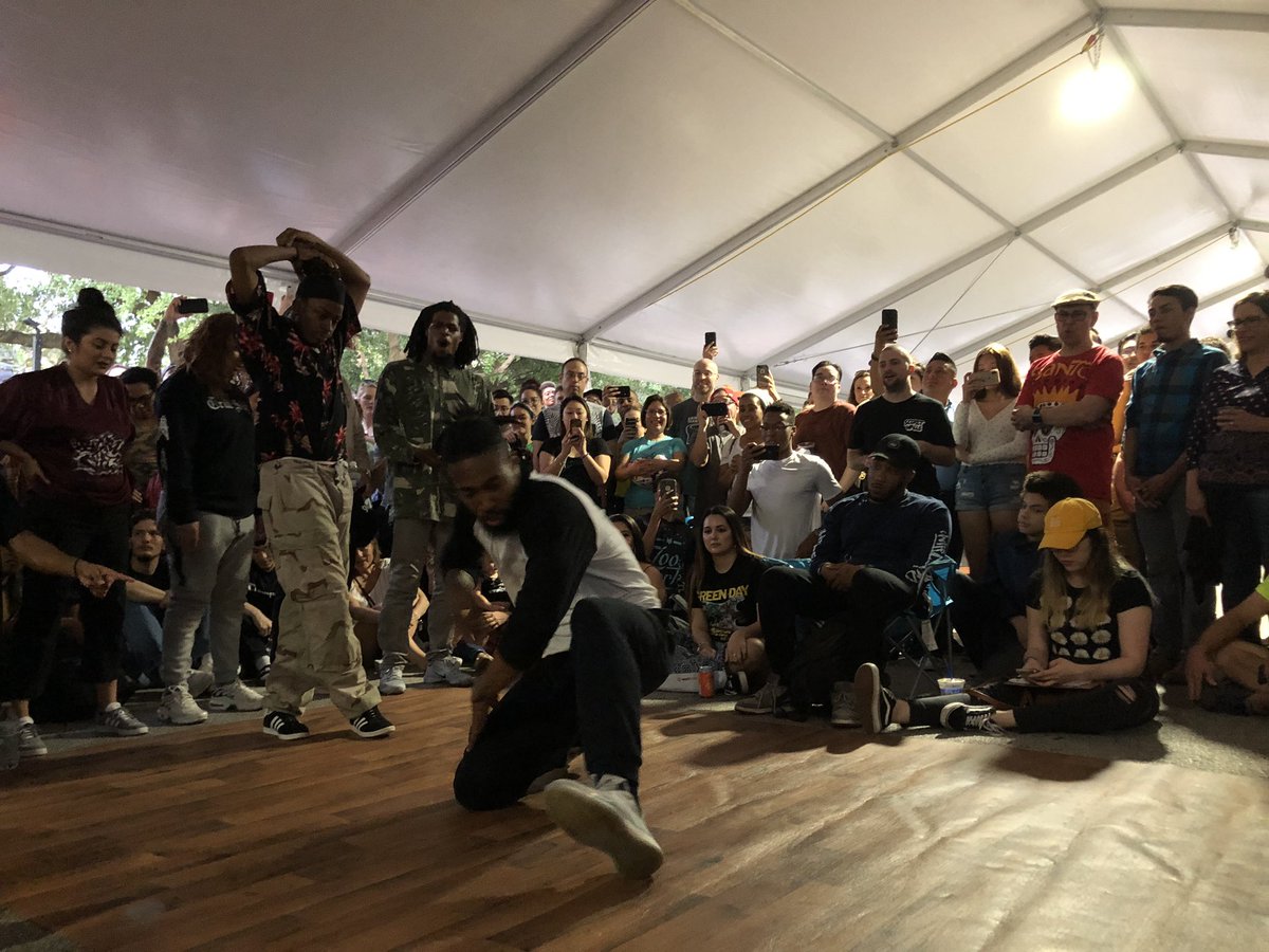 MarketSquareHou's tweet photo. .@bgirlcity bringing the heat during the breakdance @secretwallshou! Art battle starts at 8 pm. https://t.co/5hj2kFbb53
