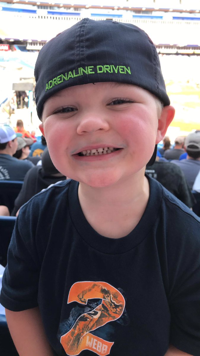 GraceeLou34's tweet photo. I don’t know if he is more excited for his first supercross or seeing his favorite @cooperwebb_2 #SupercrossLIVE #ThisRaceSavesLives #braaaaaaap 🖤🏁 https://t.co/Q1Fr7Pmf0h