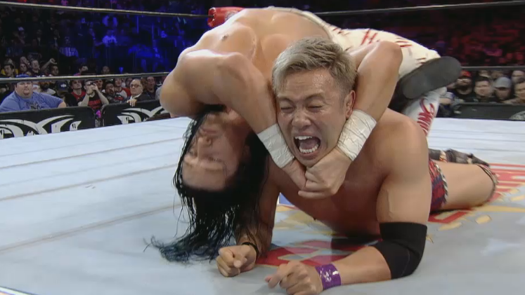 UltraLiger's tweet photo. @JayWhiteNZ traps @rainmakerXokada in a #MutaLock
#G1SuperCard https://t.co/U8001JcBEf