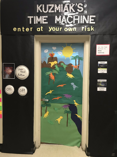 Bbarrettsbf's tweet photo. The DINO-MITE book fair is coming! Thanks to Amy B for helping decorate our door! We’re setting the time machine to “kooz” control as we chomp on a good book! #StompChompRead #mybookfair @Scholastic #parkavepride #4thgrade https://t.co/s1PGkgKYL0 https://t.co/xXwgN9lAhY