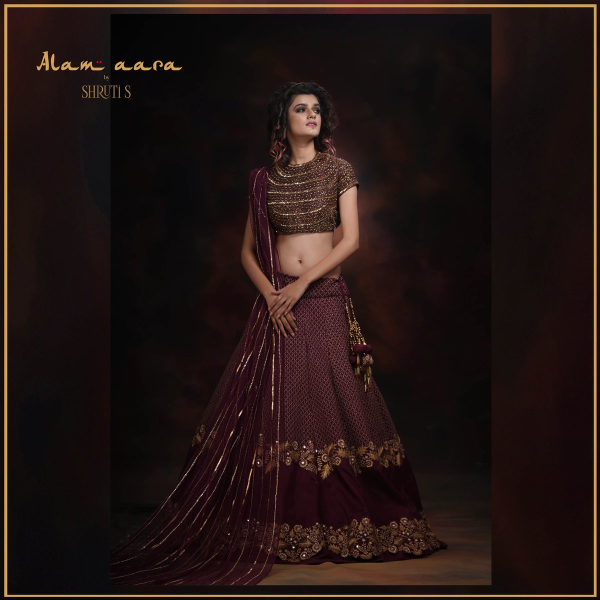 A deep-wine coloured lehenga with antique-gold, zari embroiderey.
#shrutis #shrutisingla #indiancouture #lehenga #bridallehenga #fashiondesigner #lehengacholi #embroidery #engagementdress #wedding #indianwedding #bride #weddingdress #punjabiwedding #alamaara #winecolor #wedmegood