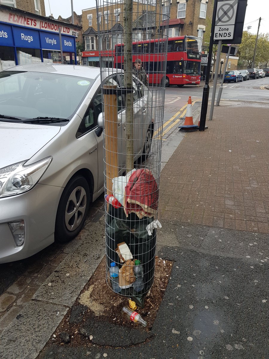 amy_morrice's tweet photo. @wfcouncil you're making me turn rapidly into my mother... FOUR trees on Tyndall road surrounded by litter. Please stop giving people a reason to use these as bins and remove the cages!!! #sadsunday #leyton https://t.co/ZBmf2NAWTt