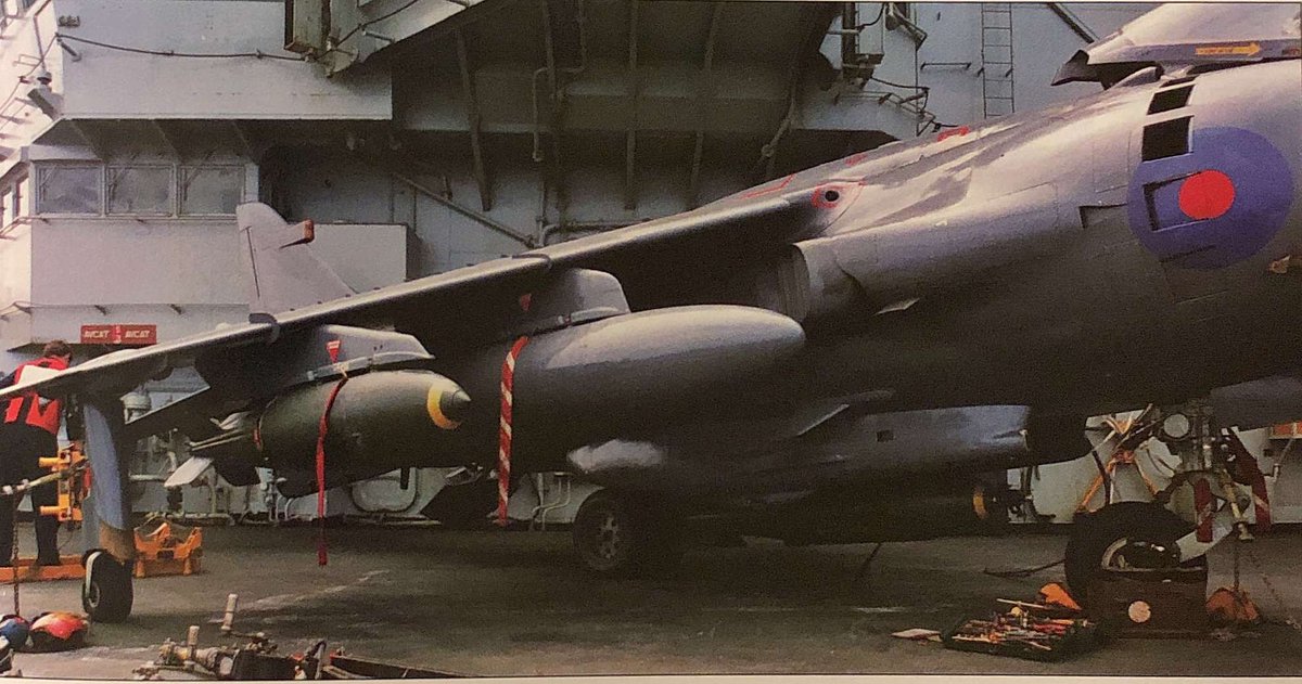 Sea Harriers on the deck of HMS Hermes prior to departure. Once at sea, the white undersides and white part of the roundels were painted over to reduce conspicuousness.