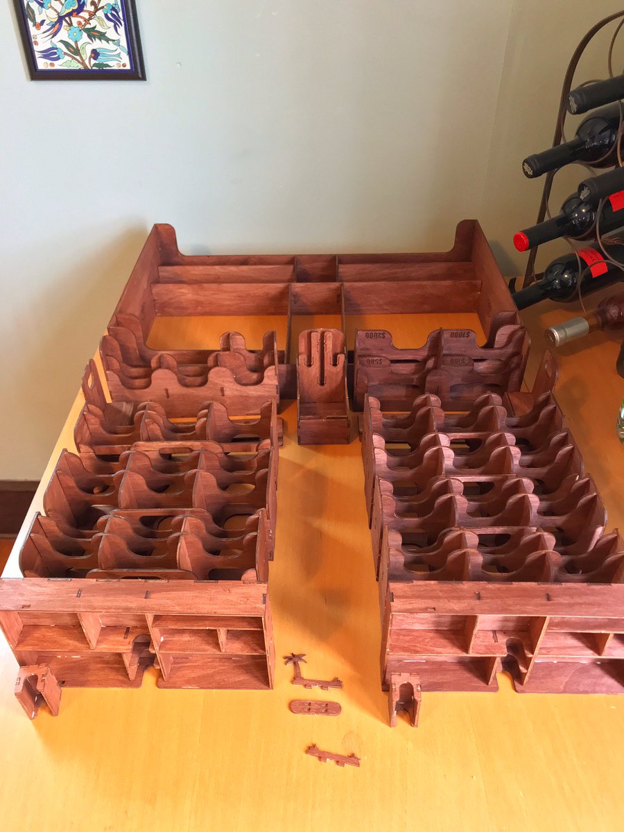 neimoyer's tweet image. Hey @tbt_gaming! Internal dividers stained, assembled, and glue now curing. Got most of the exterior parts stained and drying now. Second coating coming soon, and then lacquering! Then to assemble the #BigDamnCrate. 

(Found another “stamp” too, on Ship C 😕 )

#FireflyTheGame