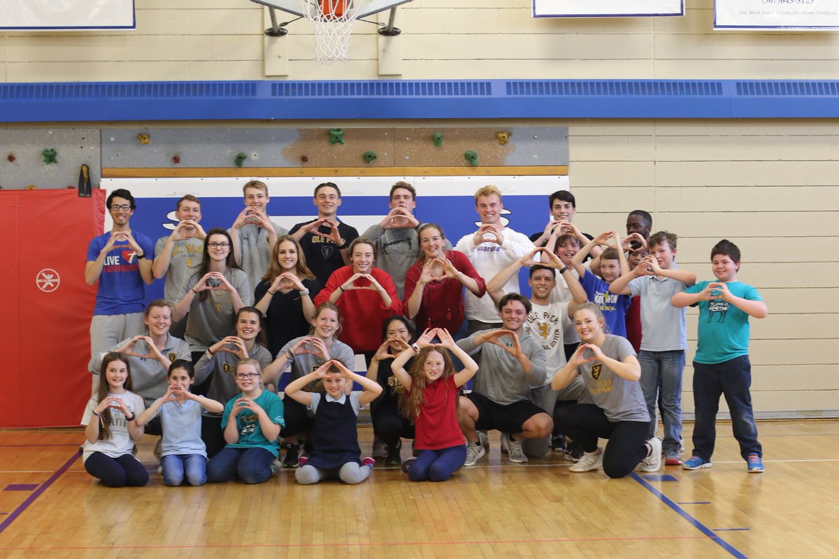 StOlafAthletics's tweet photo. On Tuesday, several of our student-athletes volunteered their time with a fourth-grade gym class at St. Dominic School. Smiles all around! #d3week #whyd3 #OlePride #UmYahYah #MIAC https://t.co/e2BeN9XWca