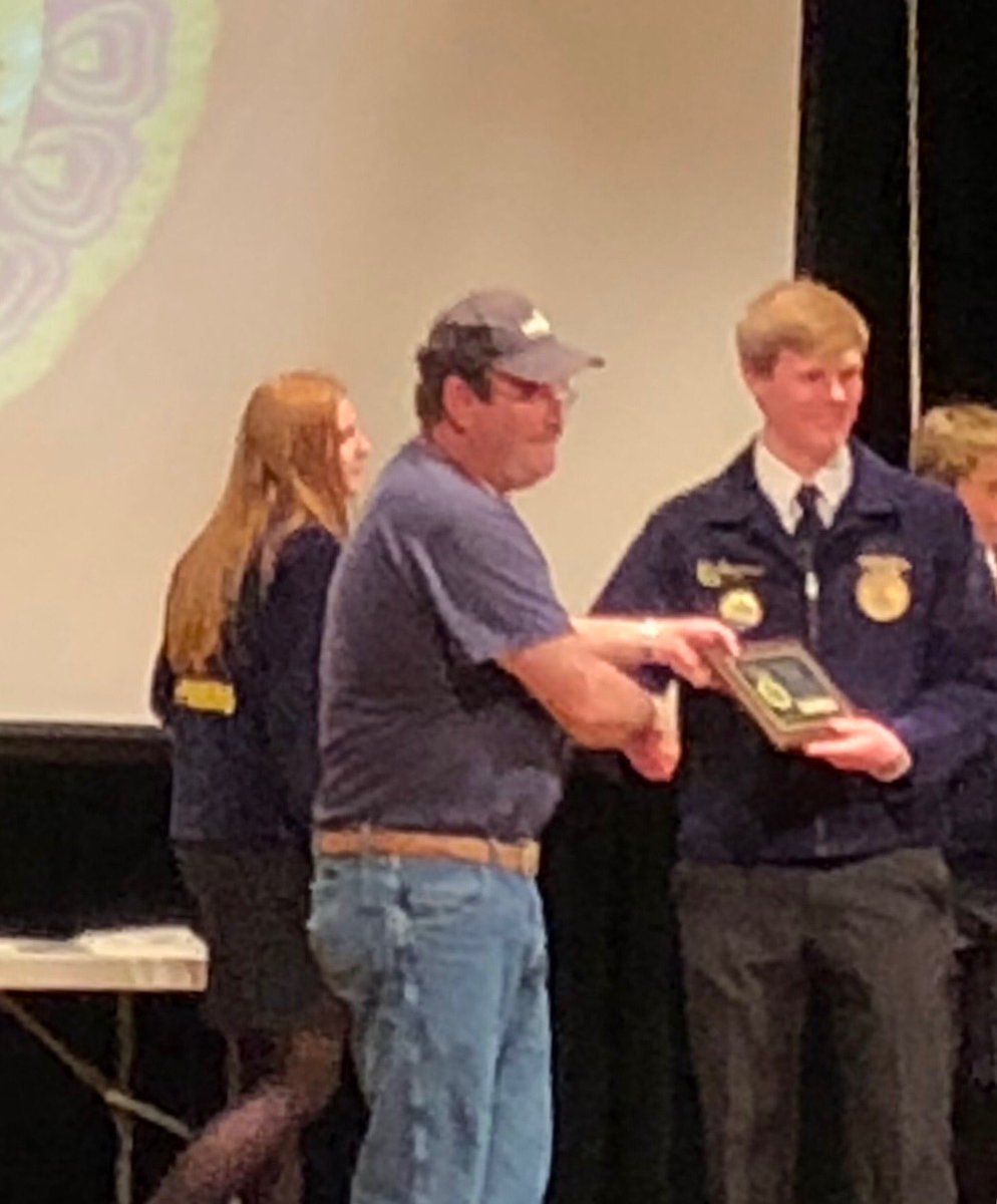 Outstanding Service Award to Scott Lingle.