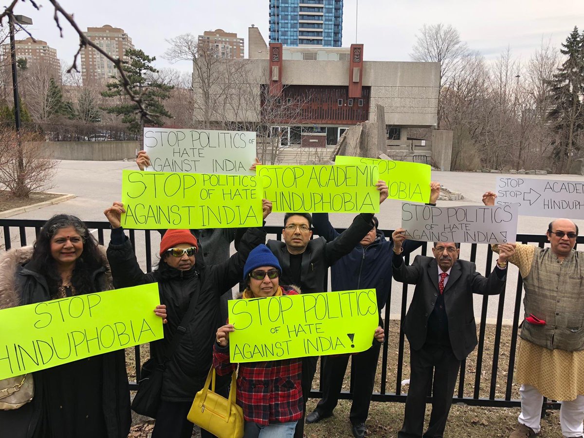TarekFatah's tweet photo. Toronto's Noor [Islamic] Cultural Centre hosts anti-India event; Islamist speakers accuse PM @NarendraModi of being anti-Muslim. Many Indo-Canadians were harrassed &amp; barred from taking pictures but they protested with signs "Stop Hinduphobia" &amp; "Stop political Hate against India" https://t.co/dCOa88hlPG