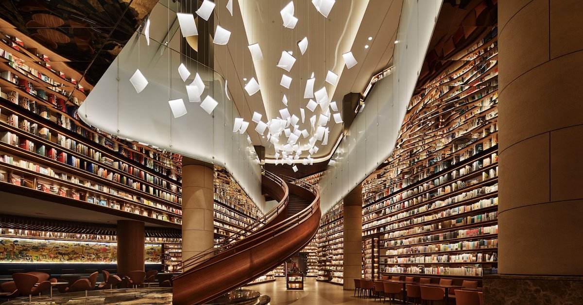 Chinese Bookstore’s Chandeliers Look Like Sheets of Paper Floating in Mid-Air bit.ly/2I30V17 #Architecture #Design