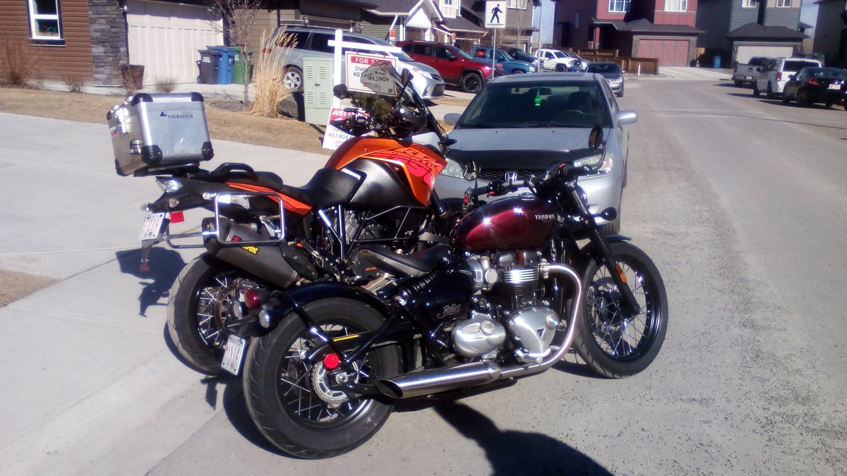Had the pleasure of taking both these babies for a ride today!
2014 KTM 1190 Adventure
2017 Triumph Bonneville Bobber
Its all about good friends and good times 😎
#motorcycle #ktm #triumph #Calgary #sundayfunday 
#Alberta <a href="/ReapersPlace/">𝔾𝕣𝕒𝕖𝕞𝕖 ℝ𝕖𝕒𝕡𝕖𝕣</a>