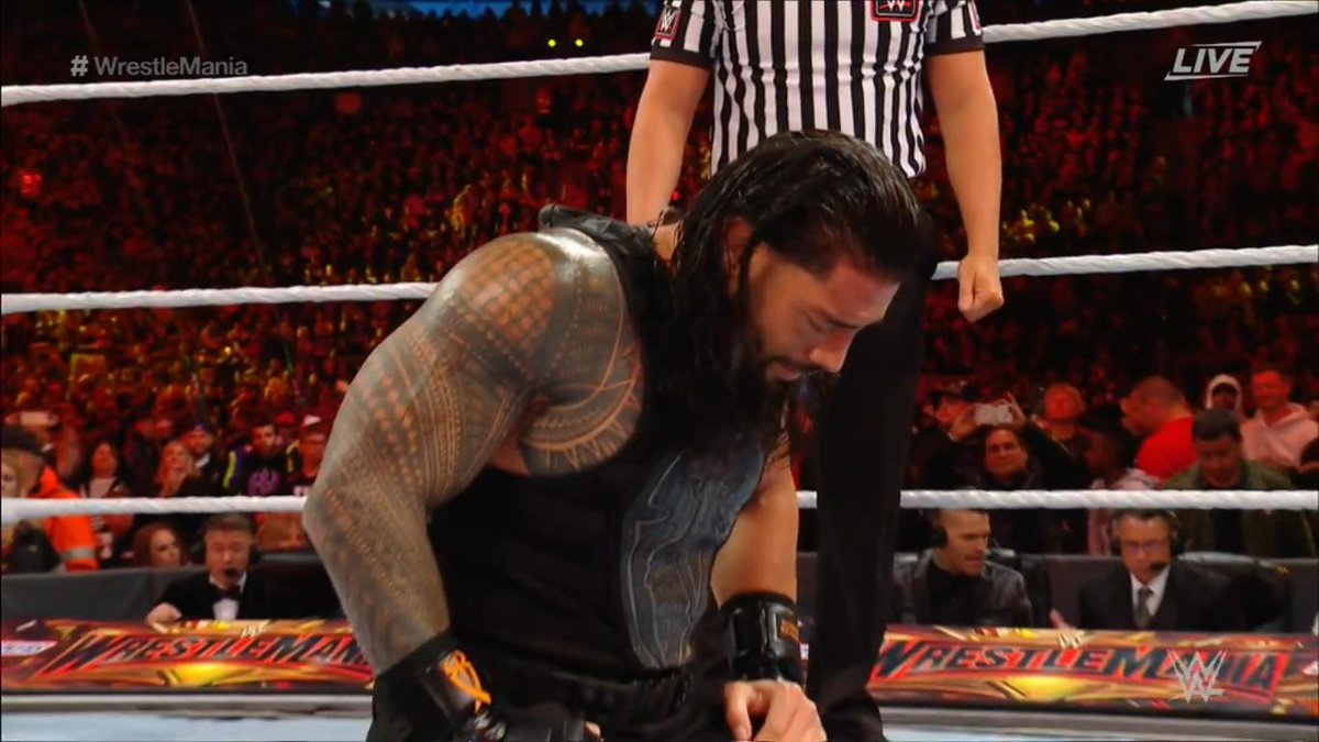 RomanReignsNet's tweet photo. After winning the match @WWERomanReigns took time to say a prayer and show how truly thankful he is to be back to being healthy and doing what he truly loves !! #Wrestlemania https://t.co/G8mIpuqhLL