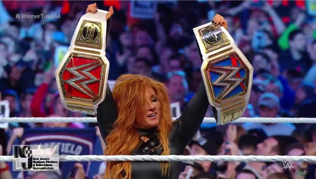 cagesideseats's tweet photo. Becky Lynch pins Ronda Rousey to win the Raw &amp; SmackDown women’s titles https://t.co/MP6Qi3ErwN https://t.co/ugsTm0jnRu