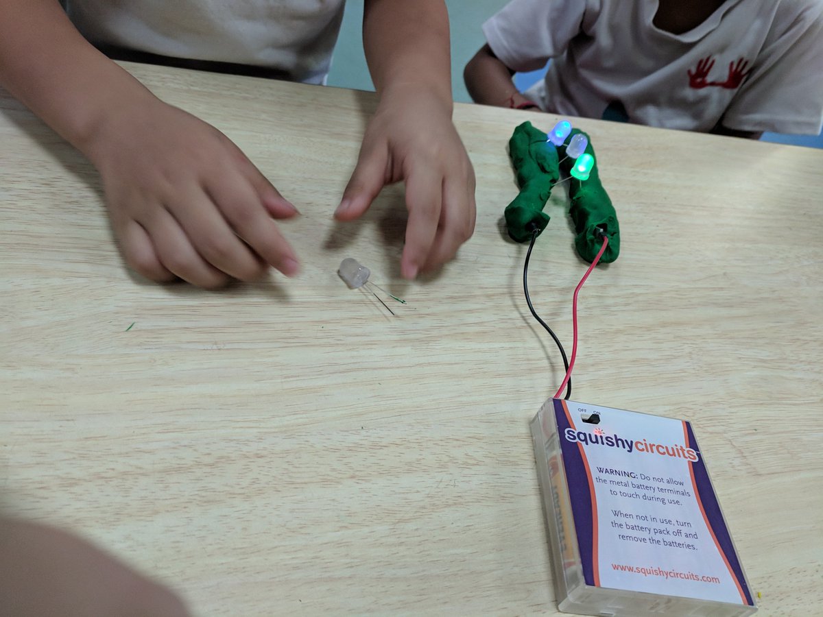 EyfsTbs's tweet photo. Today in our set room Nursery students put on their thinking caps and put together squishy play dough circuits @TBS_Delhi  #earlyyears #techEd #techtime #funwithcircuits https://t.co/o0G3m1ts6u