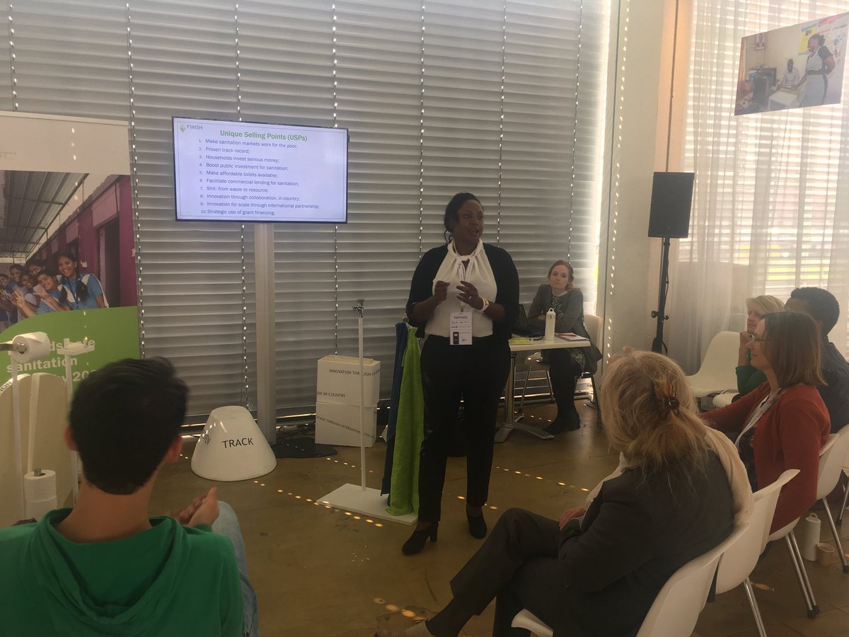 Pamela Bundi of Finish in Kenya is doing a great job explaining the Finish concept and inviting our participants to build a toilet with us @AfricaWorks2019 @WASTEadvisers <a href="/Amref_NL/">Amref Flying Doctors</a>