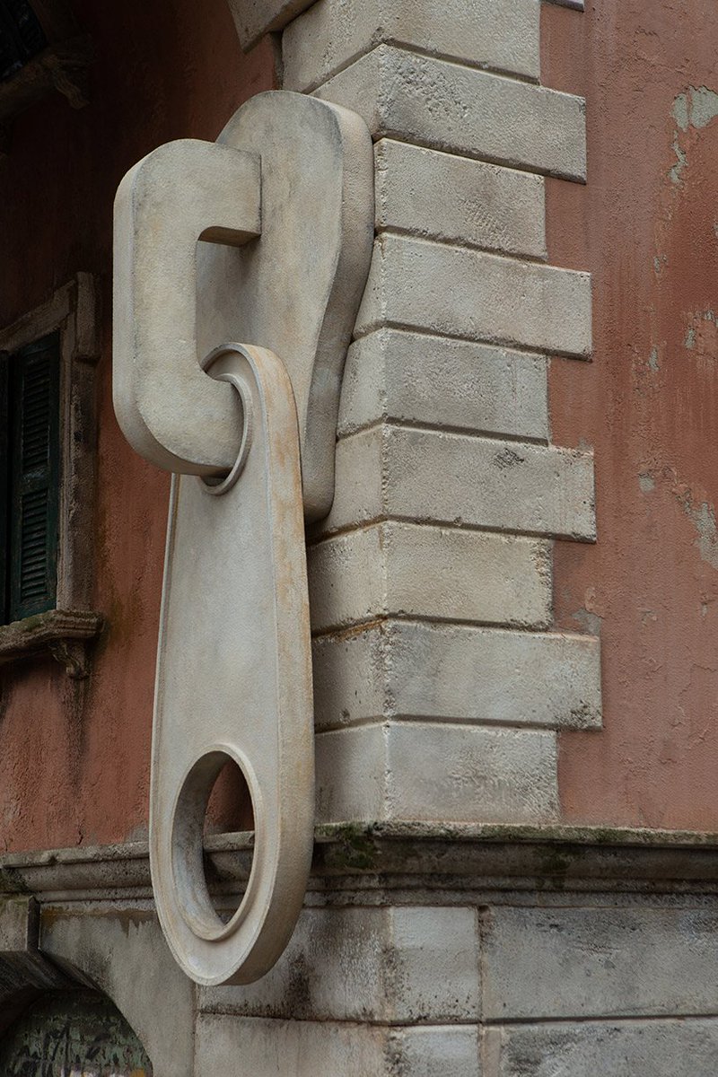 designboom's tweet photo. alex chinneck 'unzips' the façade of a traditional building for milan design week https://t.co/b5q0oteyiW https://t.co/tNAzpXFrKE