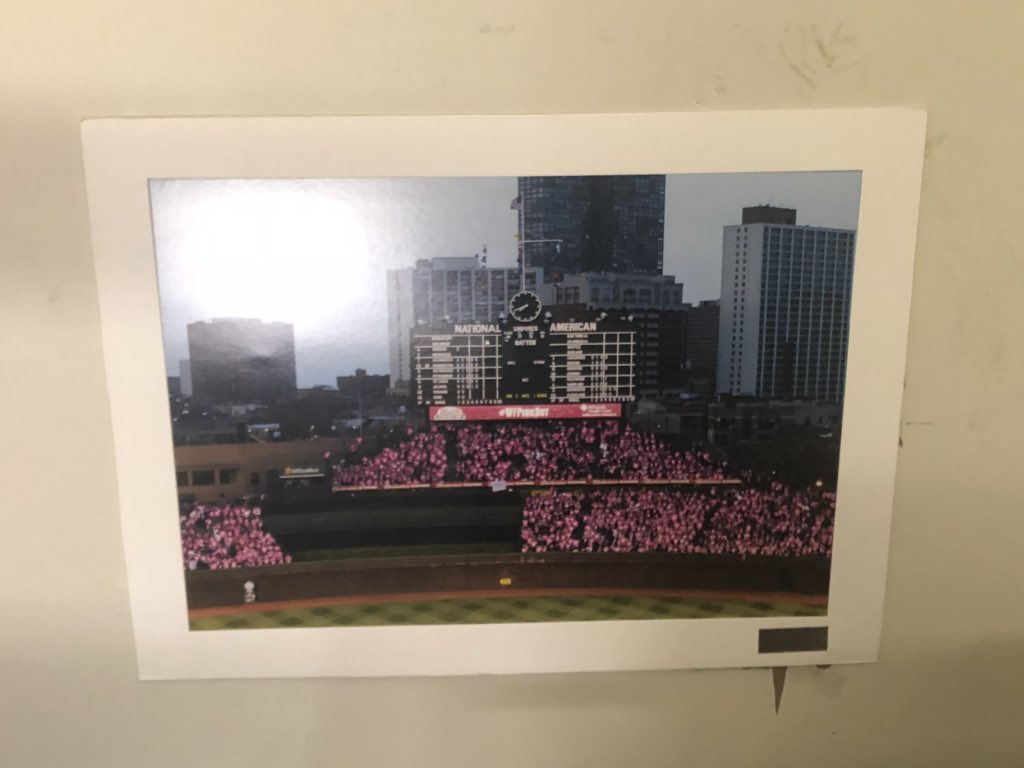 madkenney's tweet photo. The Cubs have taken down their “no women allowed” art. They replaced it with a photo of Wrigley Field on #PinkOut Night https://t.co/a0Yt1GmqfN