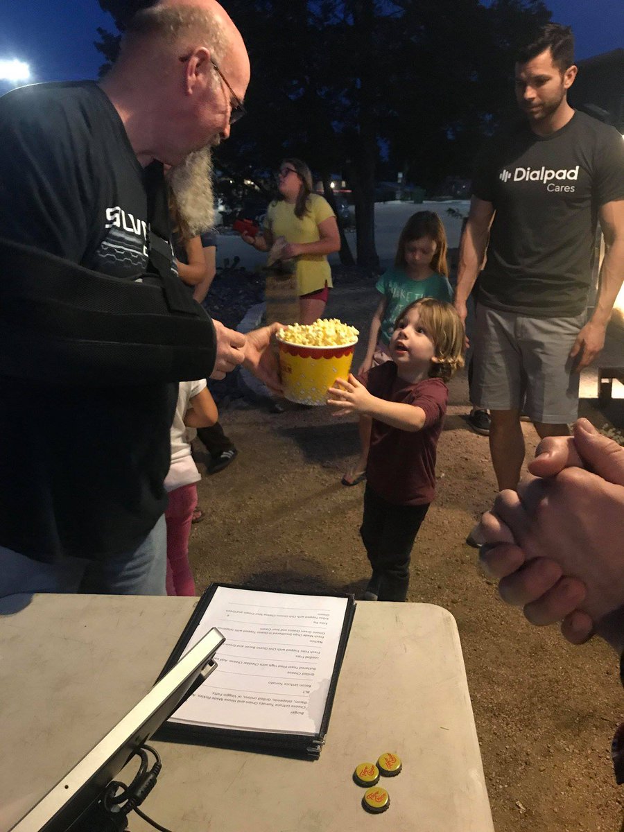 dialpad's tweet image. Another successful volunteer event with our friends @mobileloaves, serving up popcorn and smiles at their weekly community move night! 🍿🎬 #WeAreDialpad #GiveBack #ServingGoodness #ATX