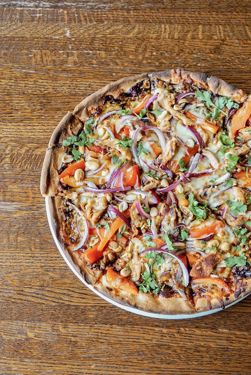 The best kind of pizza made in a Wood-Stone Oven 🔥🔥

BBQ Amish Pizza: peanuts, red bell pepper, cilantro