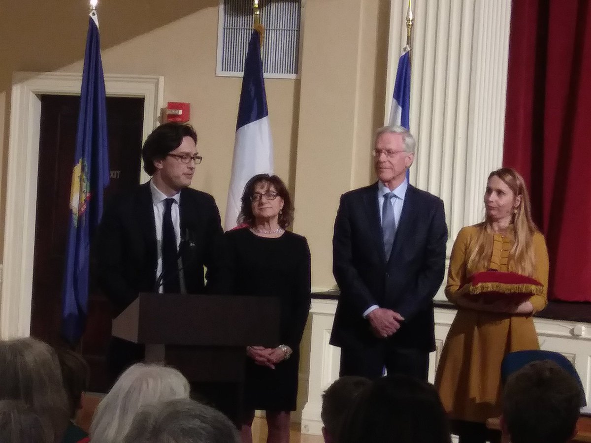 VermontQuebecEI's tweet photo. At today's ceremony in Burlington celebrating La Francophonie, Honorary Consul of France to VT Ernie Pomerleau and Lise Veronneau, President, Honfleur Sister City Committee, received the Chevalier of the Order of Merit from Mr. Arnaud MENTRÉ, CG of France in Boston. https://t.co/sZtWZmoiWo