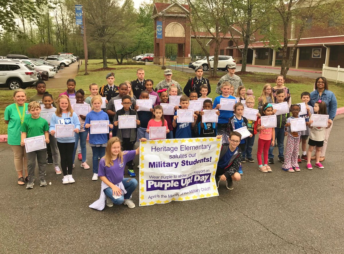 madisonschools's tweet photo. Heritage Elementary today honored students w/ parents in the military. Ambassadors from the eS2S (student-to-student mentoring group) led military kids to the flagpole where Jr. ROTC from JCHS conducted a ceremony. Everyone wear purple April 18 to honor military kids. #mcslearn https://t.co/Ka2InrELJG