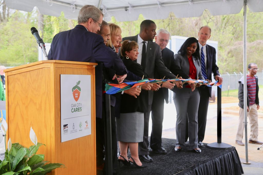 CathCharDoR's tweet photo. What an exciting day as we celebrated the Ribbon Cutting of @OakCityCares!

We are grateful to @RaleighGov, @WakeGOV, @RaleighHomeless &amp; our many other partners who came together to open the doors to this incredible new program! #EndHomelessnessWake https://t.co/ptN2B1E0YG https://t.co/rEZgiOfJqS