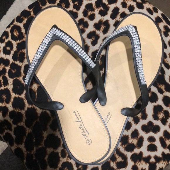 white line flip flops