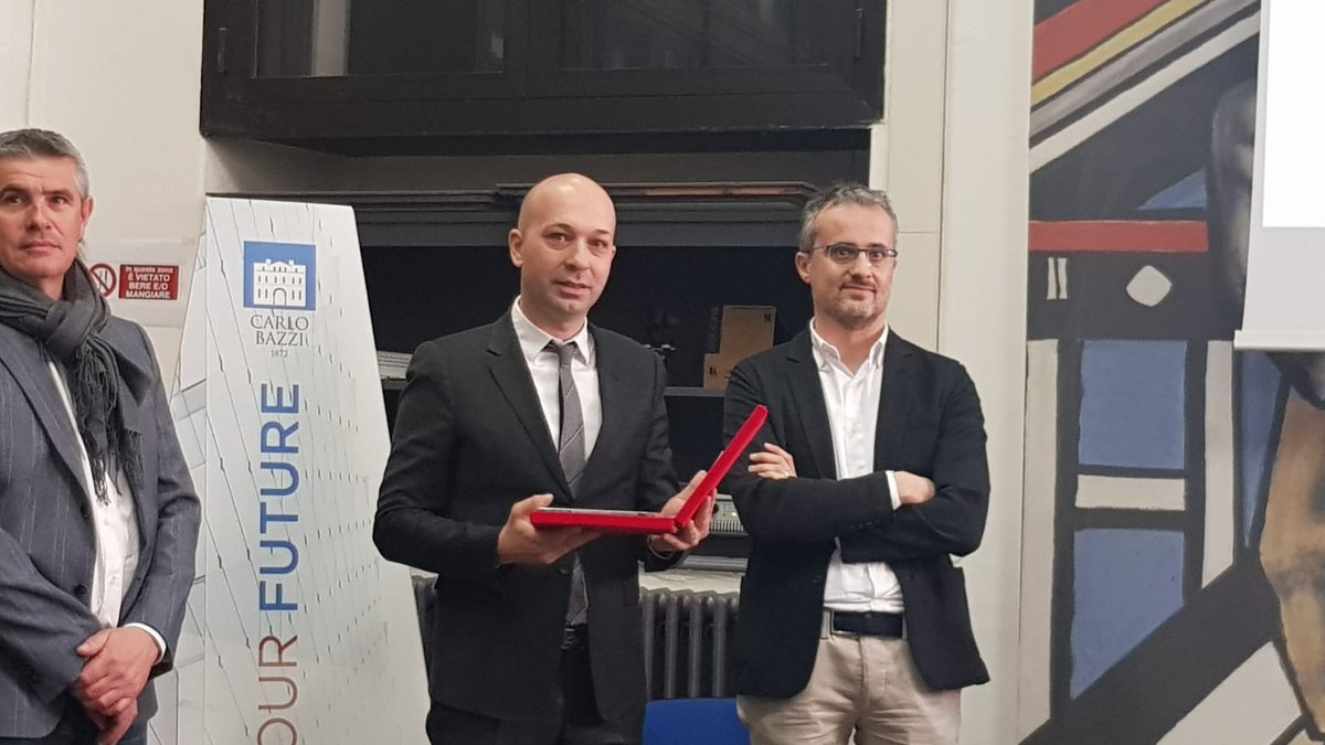 AnceMilano's tweet photo. Luca Cazzaniga, Presidente ITI Bazzi, e Filippo Rigoli, Presidente @EsemCpt , premiano i vincitori del concorso di idee #buildoursafety #Packaging #innovation in #cantiere #digital #safety #design #recycling https://t.co/jRvrT8O12J