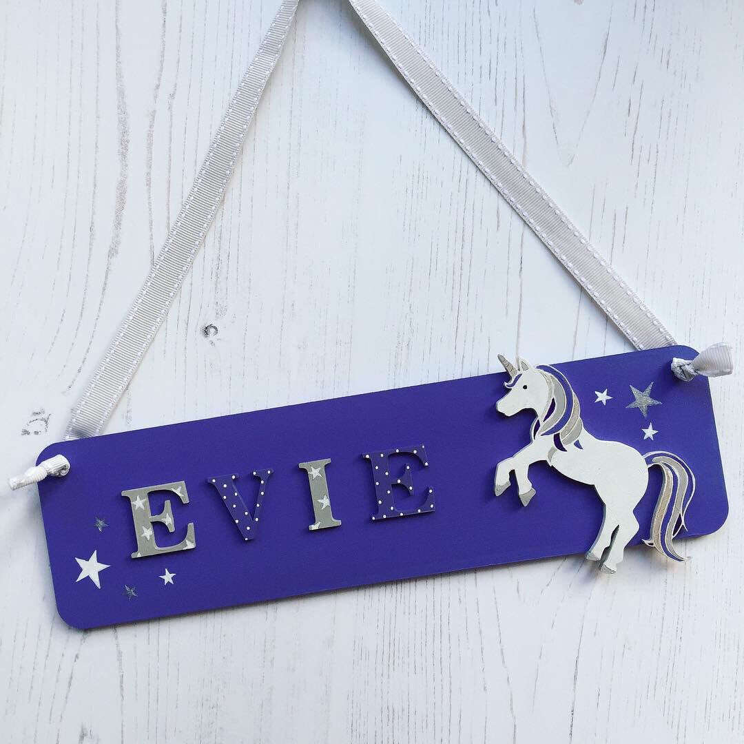 FoxWhale's tweet photo. It’s National Unicorn Day! These name signs can be painted in a whole rainbow of colours https://t.co/axf8D4Qaqx https://t.co/oS8g9pxSZI