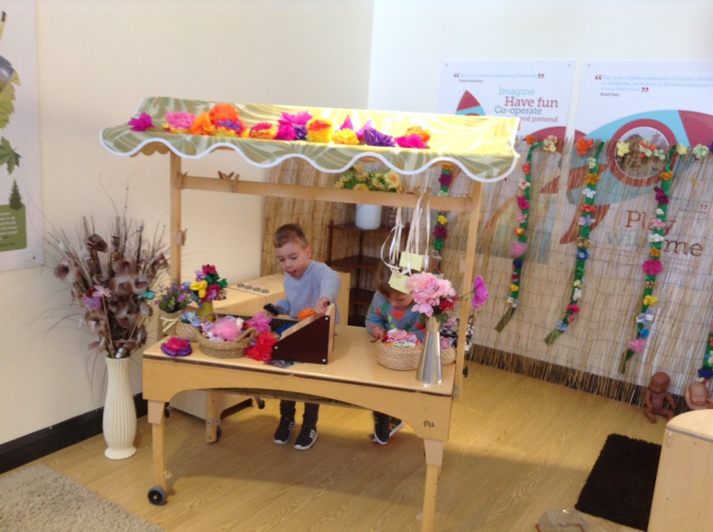 AshbridgeMaxy's tweet photo. Foxes flower shop is open for business now ! We are selling beautiful fresh flowers , deciding pricing and taking phone orders."how much for this one?" 
" the phone is ringing for you, hurry!"  @NDNAtalk  #EYtalking #peopleandcommunity #tinyflorists #eyfs #TuesdayMorning https://t.co/IXuQNmeZ0b