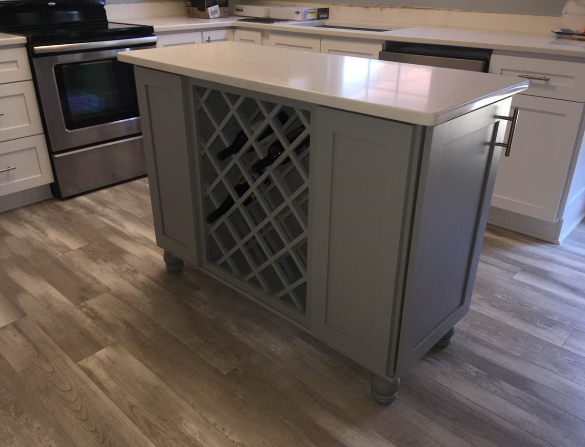 WebDonInc's tweet photo. Have you been looking for something new to add to your kitchen? This beautiful custom island by Re-Thinkin’ Home features our Asheville cabinet with an added wine rack. It is perfect for entertaining! For more Asheville projects see our product page: https://t.co/1Xbv8tsrbg https://t.co/fgYFIze0bF