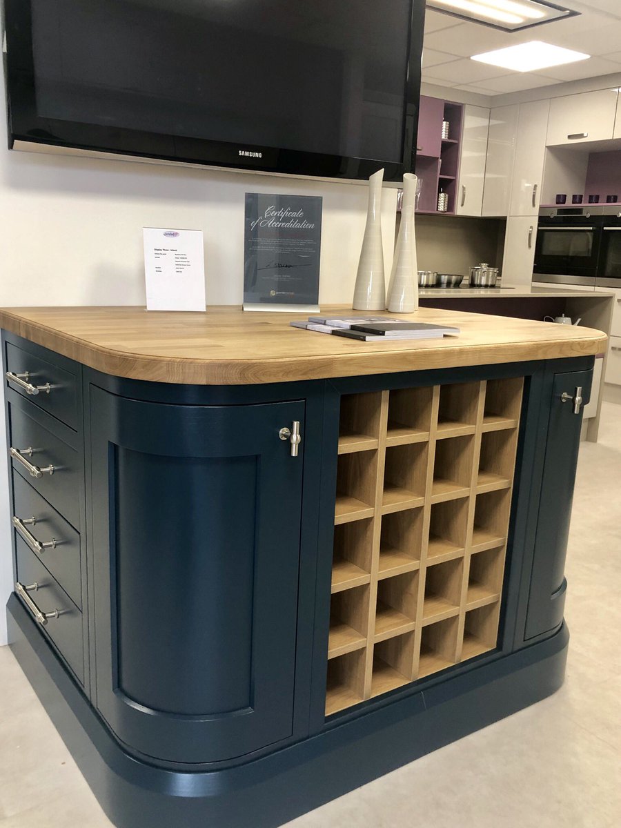 Loving this Baystone Ink Blue island unit with oak drawers and worktop in our brand new Exeter showroom #fikitchen #exeter #kitchendesign